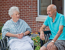 Photo of elderly couple talking. Links to Gifts from Retirement Plans.